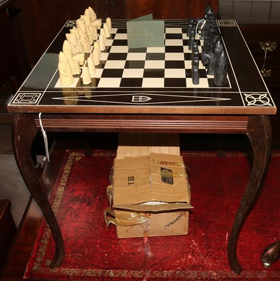 Old Forge inlaid chess table and a composition Lewis chess set